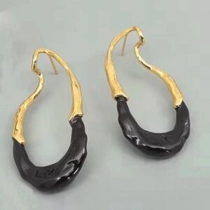 Black enamel and gold drip dangle earrings; nwot